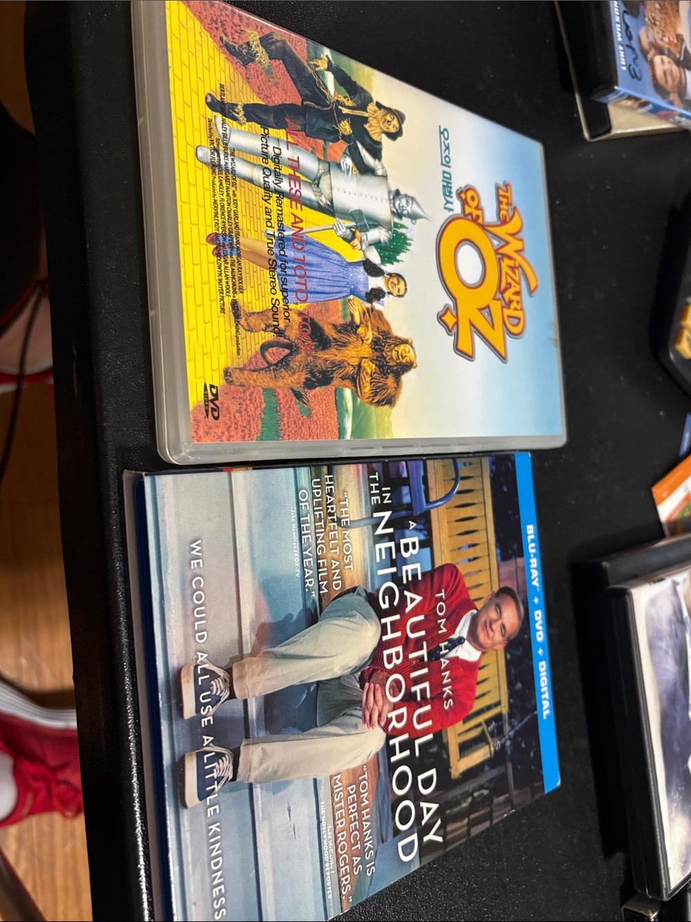 Tom Hanks Beautiful Day in the Neighborhood and Wizard of Oz DVDs.